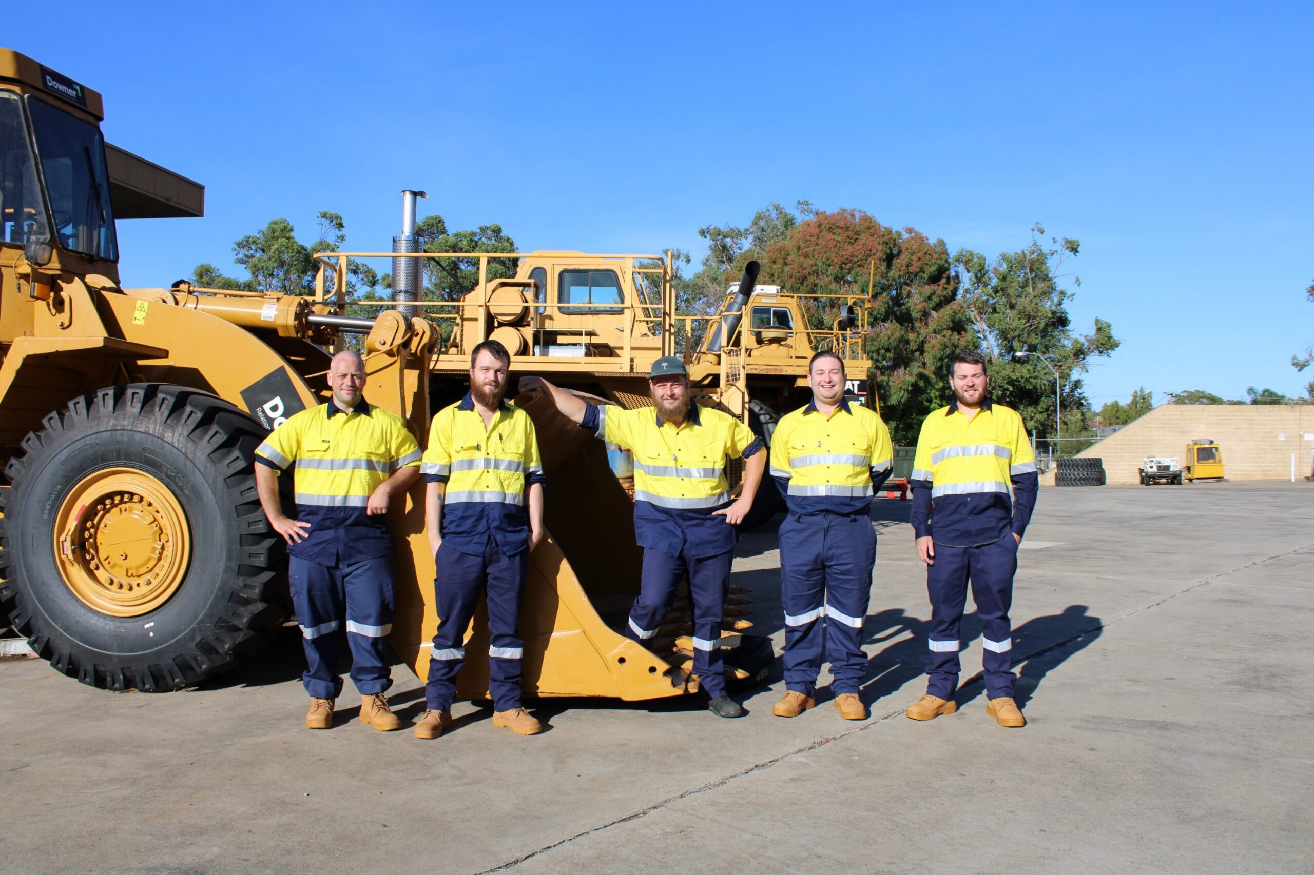 Light vehicle mechanic team with heavy plant equipment